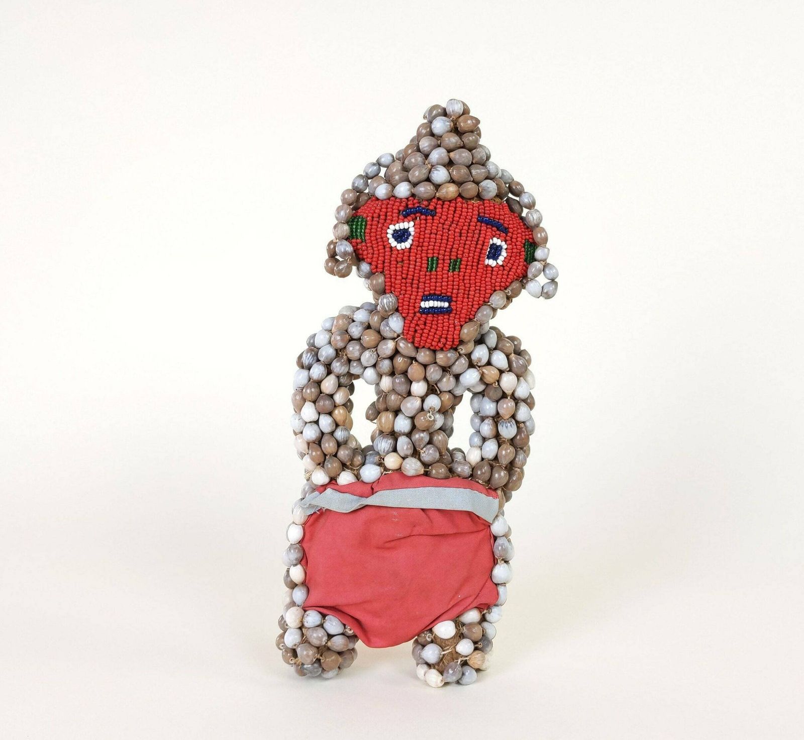 Primitive African Tribal Art Doll With Red Bead Face And Seed Grain Covered Burlap Body