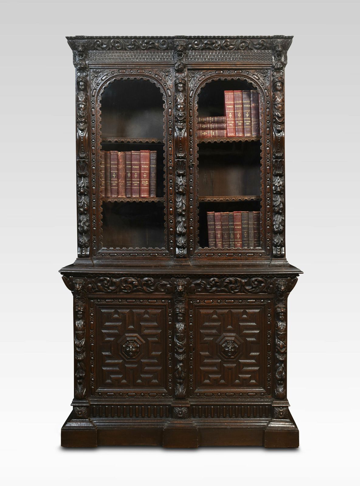 Renaissance Revival Carved Oak Two Door Bookcase