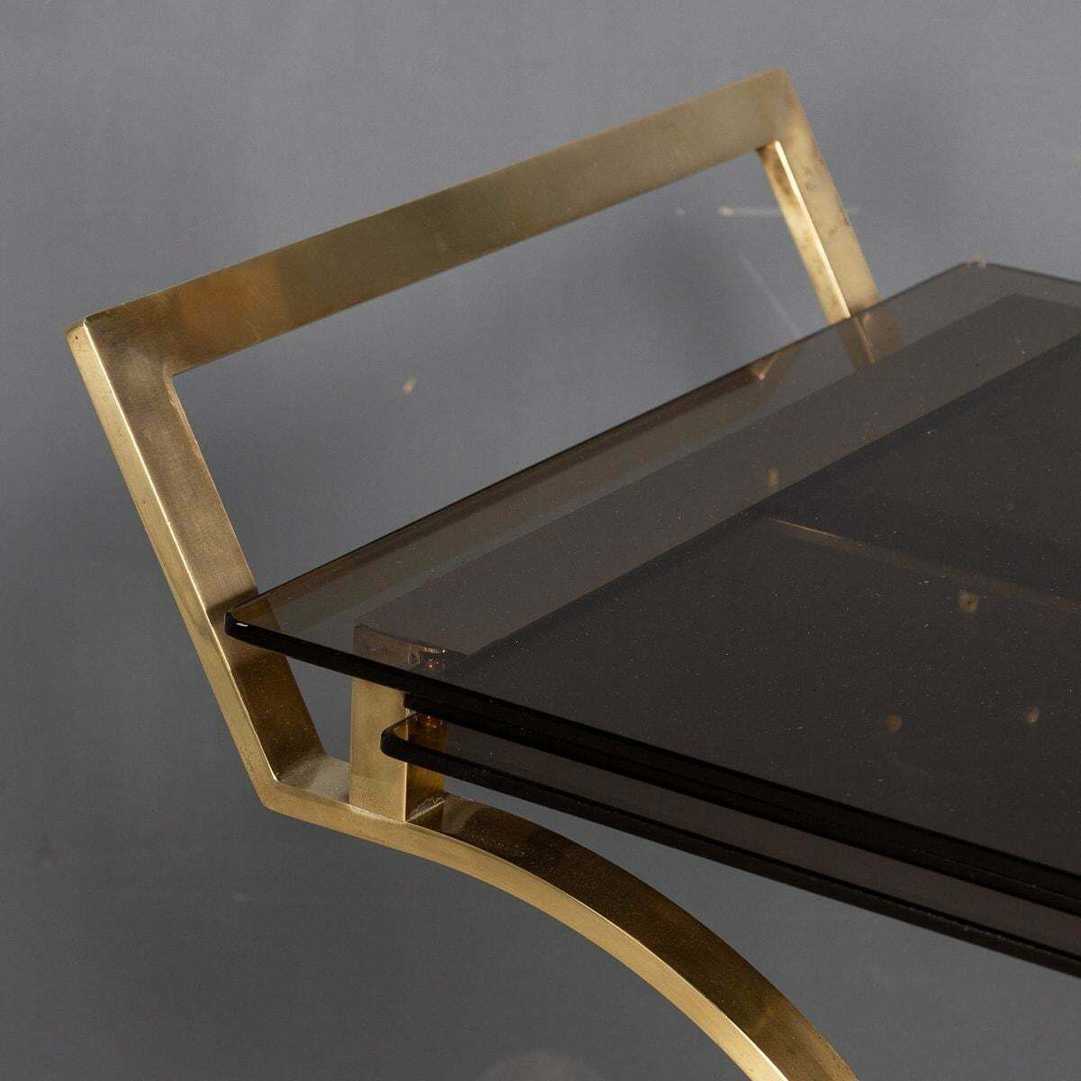photo furniture 20th Century French Three Tier Brass & Glass Bar Trolley By Maison Bagues