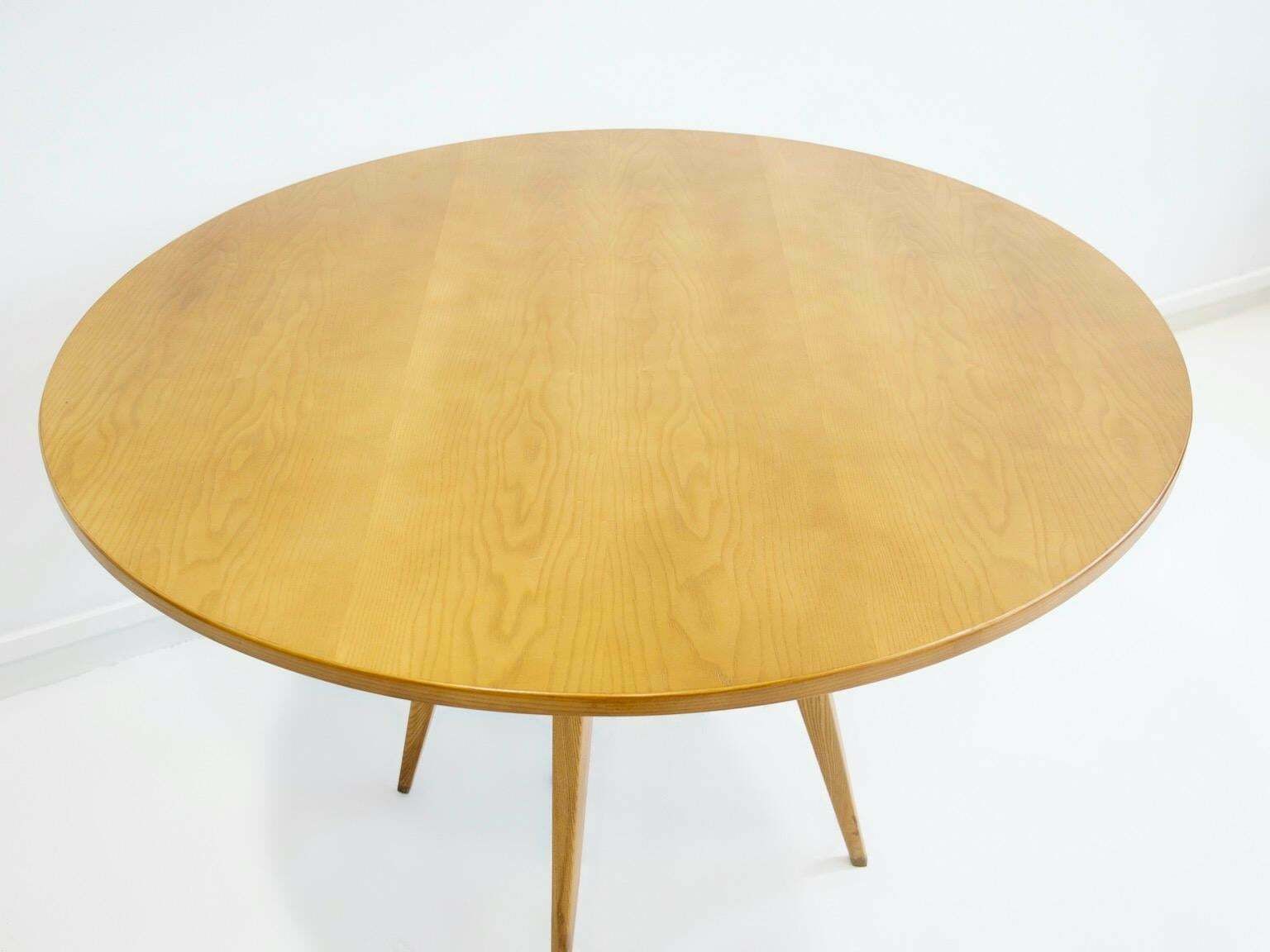 Round Dining Table Of Ash Wood With Brass Details photo Furniture