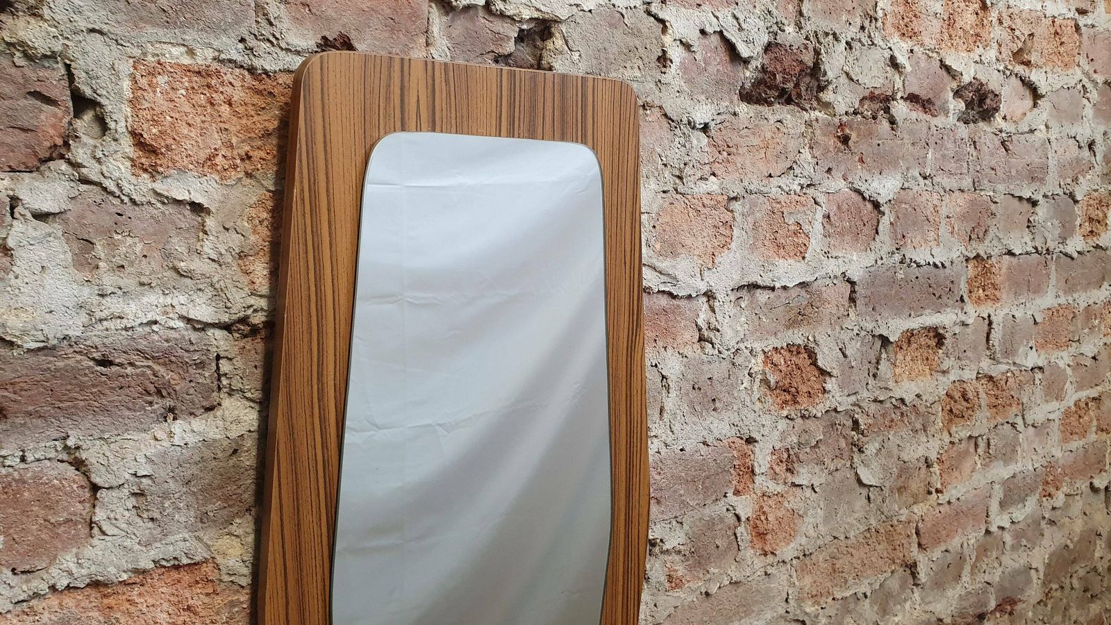 Large Shaped 60’s Wood Effect Retro Mirror photo for sale