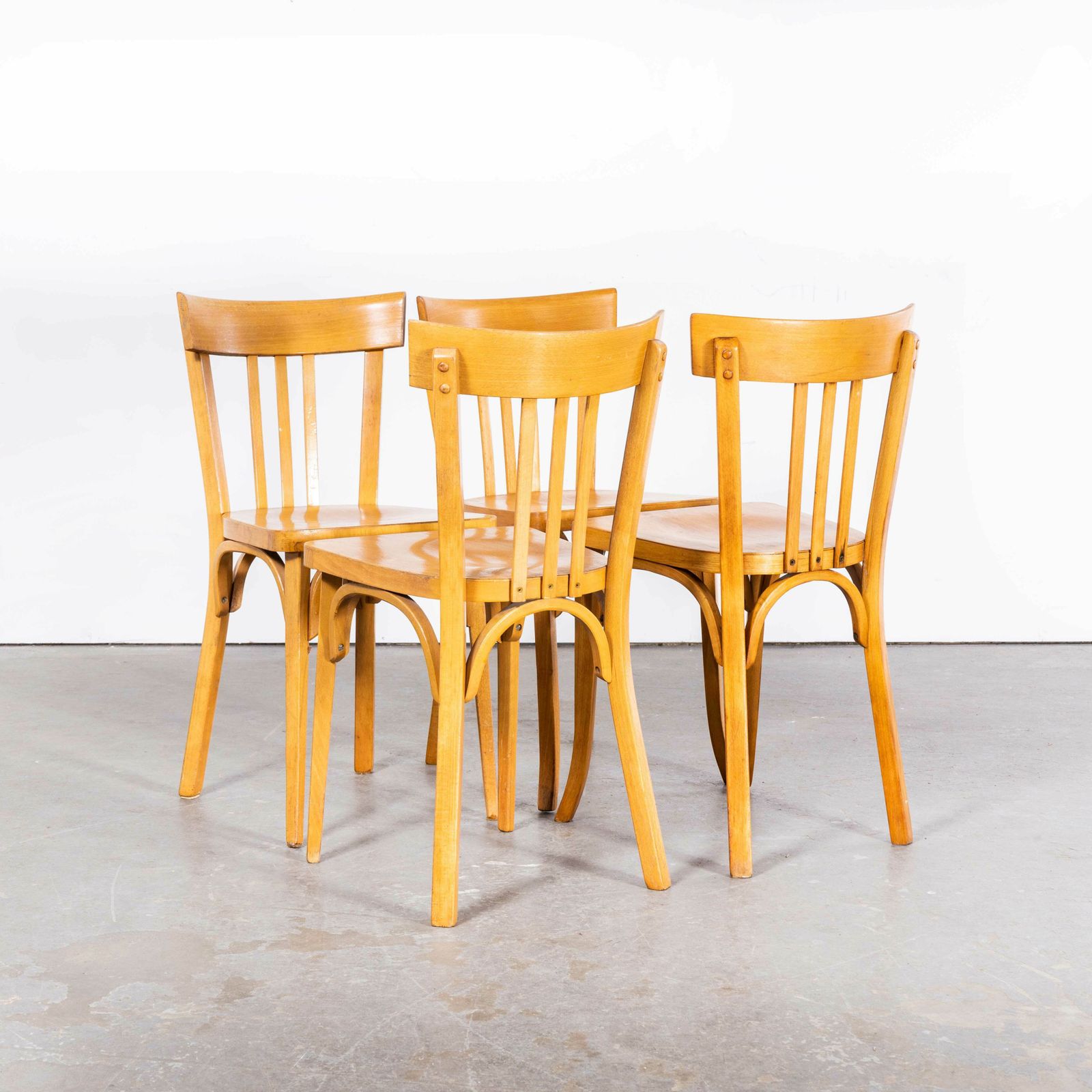 1950’s French Baumann Blonde Beech Tri Back Bentwood Dining Chairs – Set Of Four photo for sale