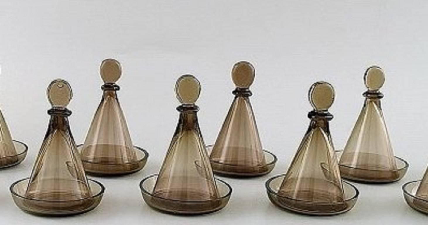 Jacob Bang: "Helan Går". Brown Glass Decanter And Ten Schnapps Glasses photo for sale