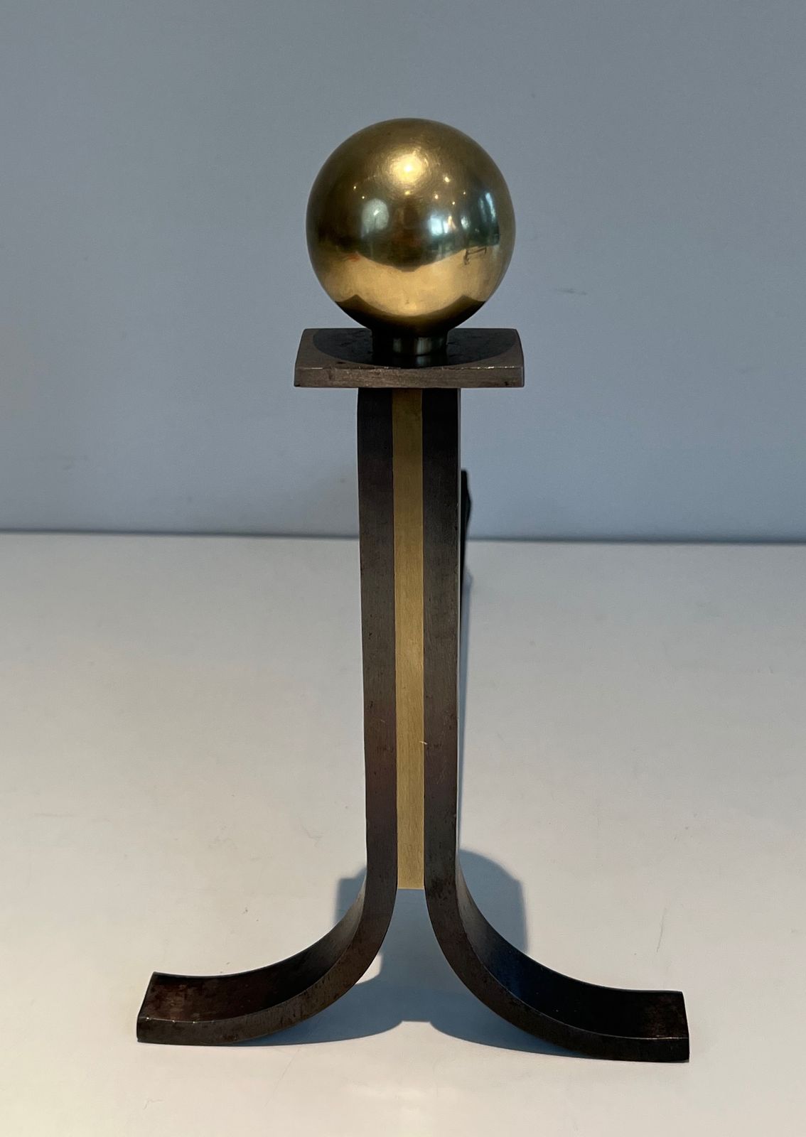 photo furniture Pair Of Modernist Andirons In Steel, Brass And Wrought Iron In The Style Of Jacques Adnet