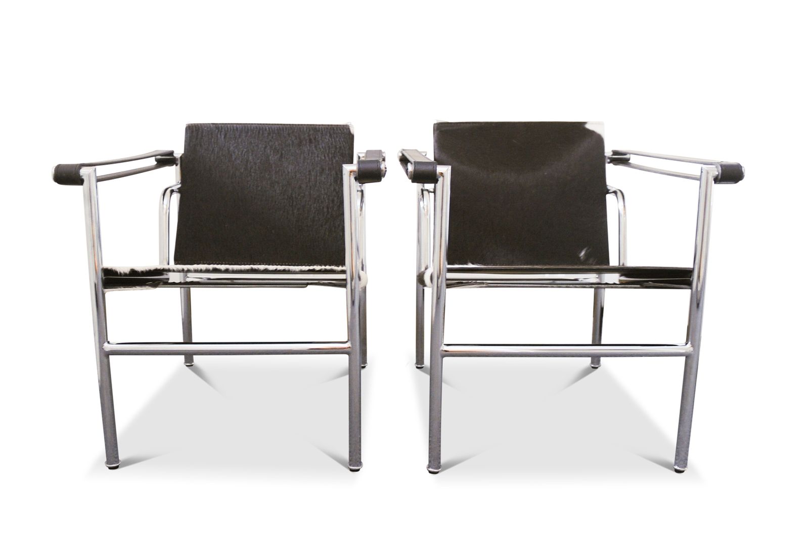Le Corbusier, Pierre Jeanneret, Charlotte Perriand Design Lc1 Pony Skin Tubular Frame Sling Armchair No Labels Price Per Chair Two In Stock Ol photo for sale