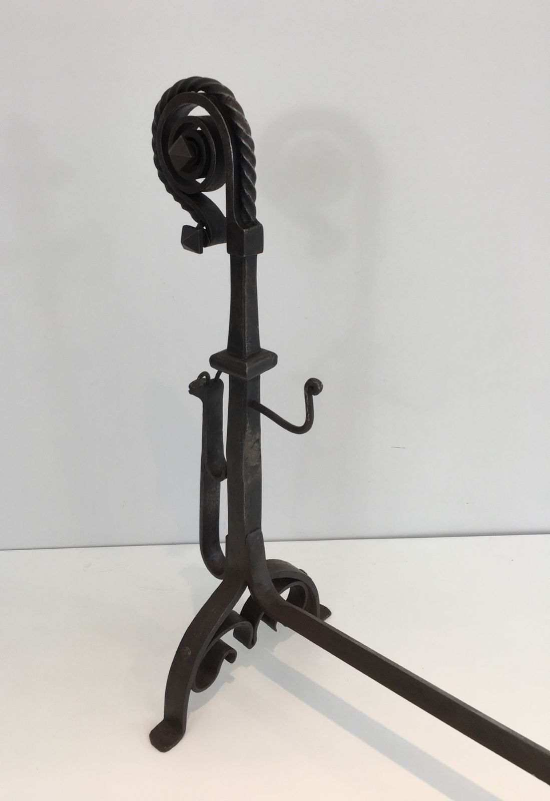 photo furniture Pair Of Important Wrought Iron Andirons Representing A Snail
