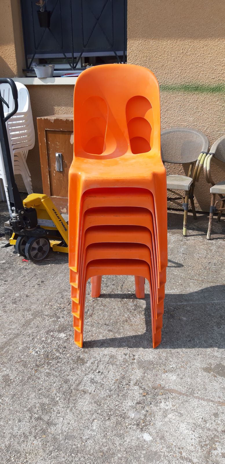 photo buy 12 Stackable Orange Plastic Chairs
