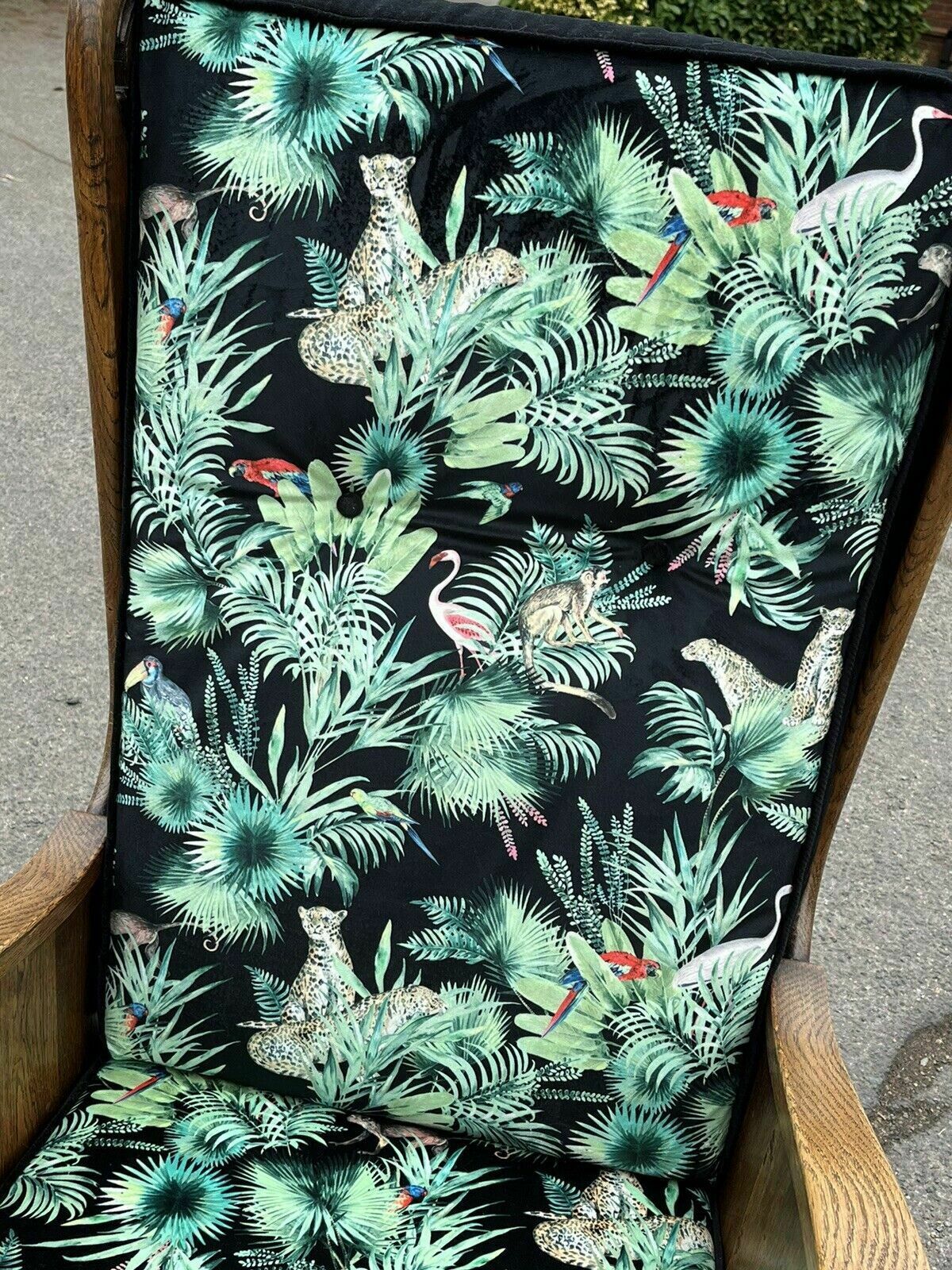 photo vintage Mid Century Oak Armchairs Newly Upholstered In A Bright Jungle Print.