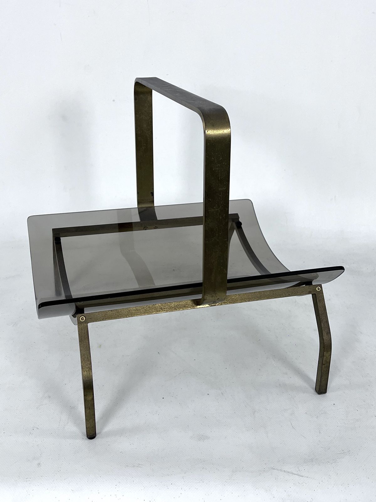 photo furniture Fontana Arte, Mid Century Brass And Curved Glass Magazine Holder. Italy 1960s