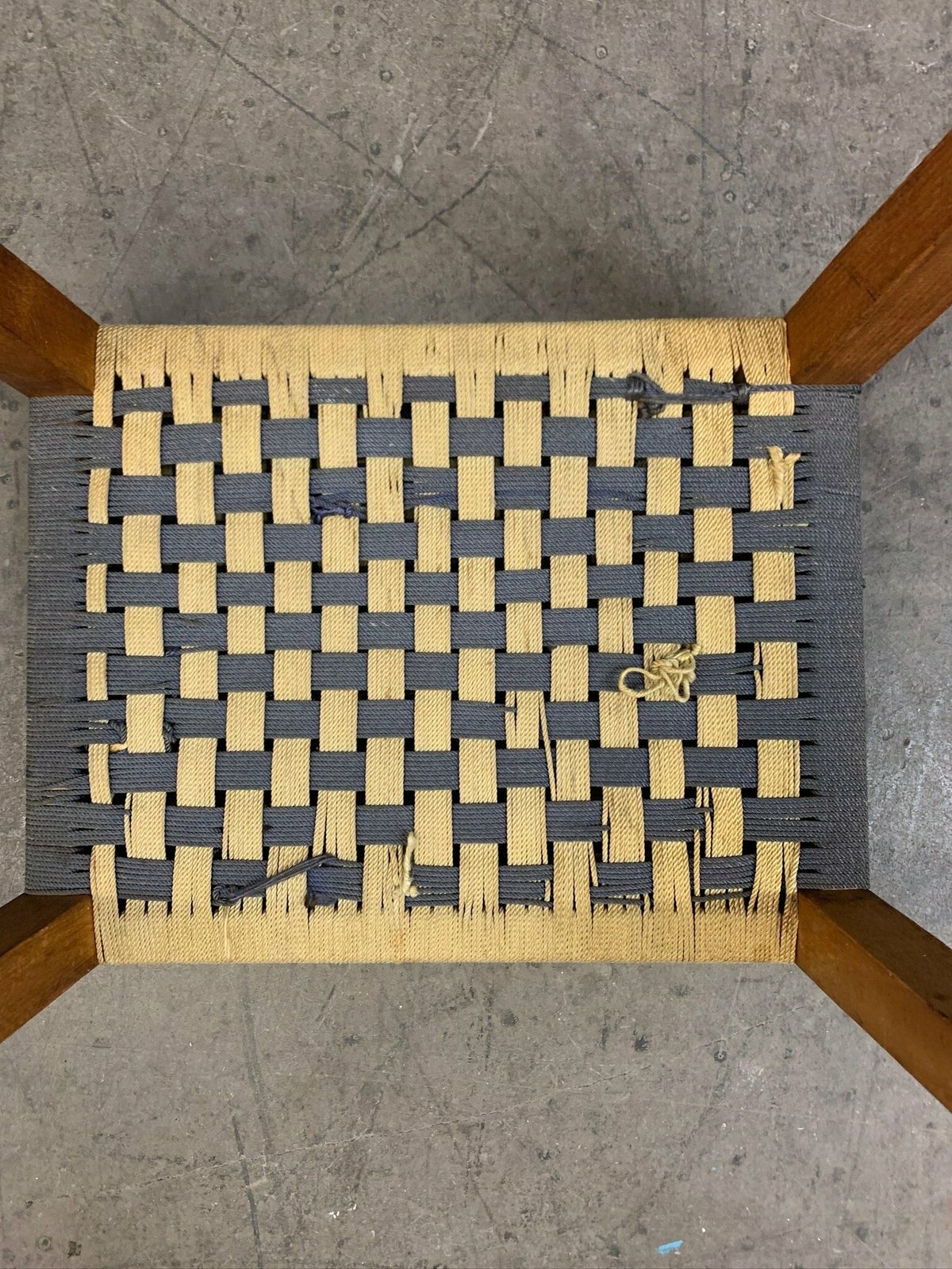 Cute Little Footstool With Woven Rope Seat And Slanted Legs photo 55.0