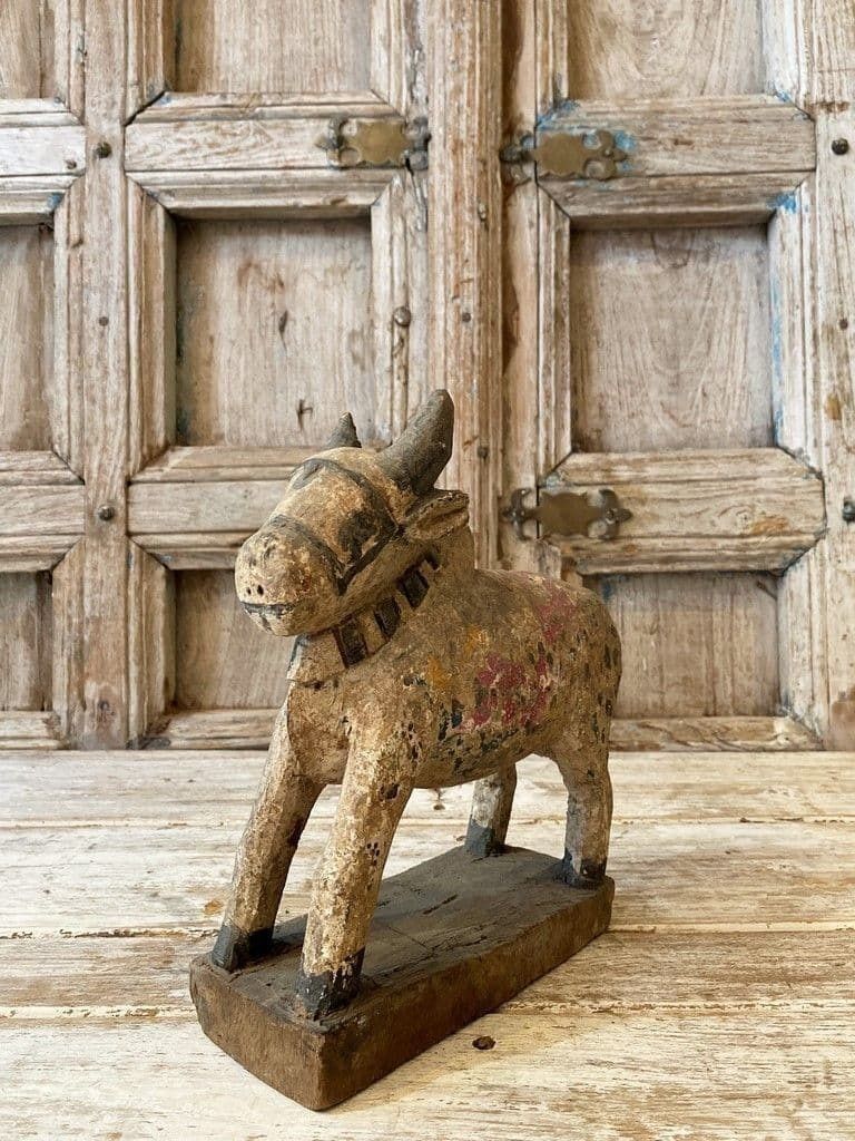 Wooden Nandi Bull With Faded Paint photo furniture