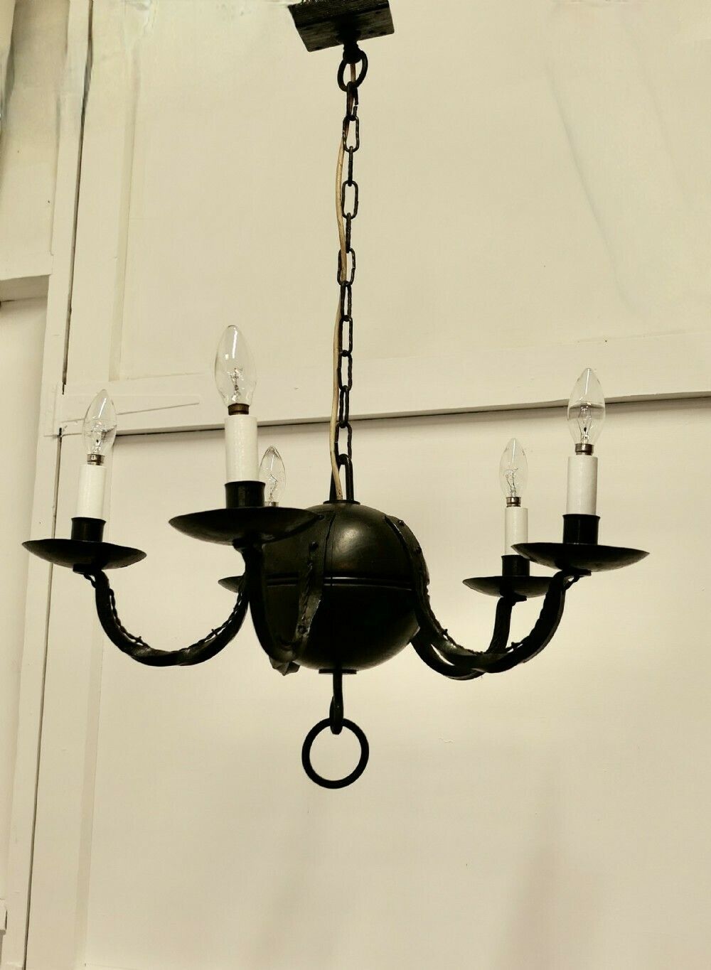 A Superb Gothic Iron And Wood Chandelier