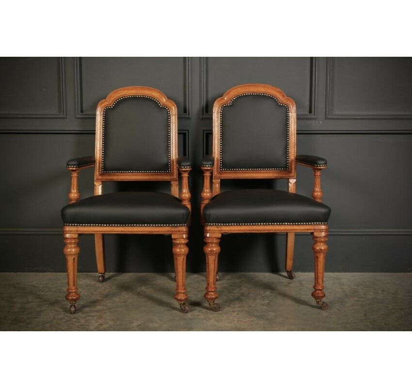 Pair Of Gothic Oak & Leather Chairs By W.Williamson & Sons.