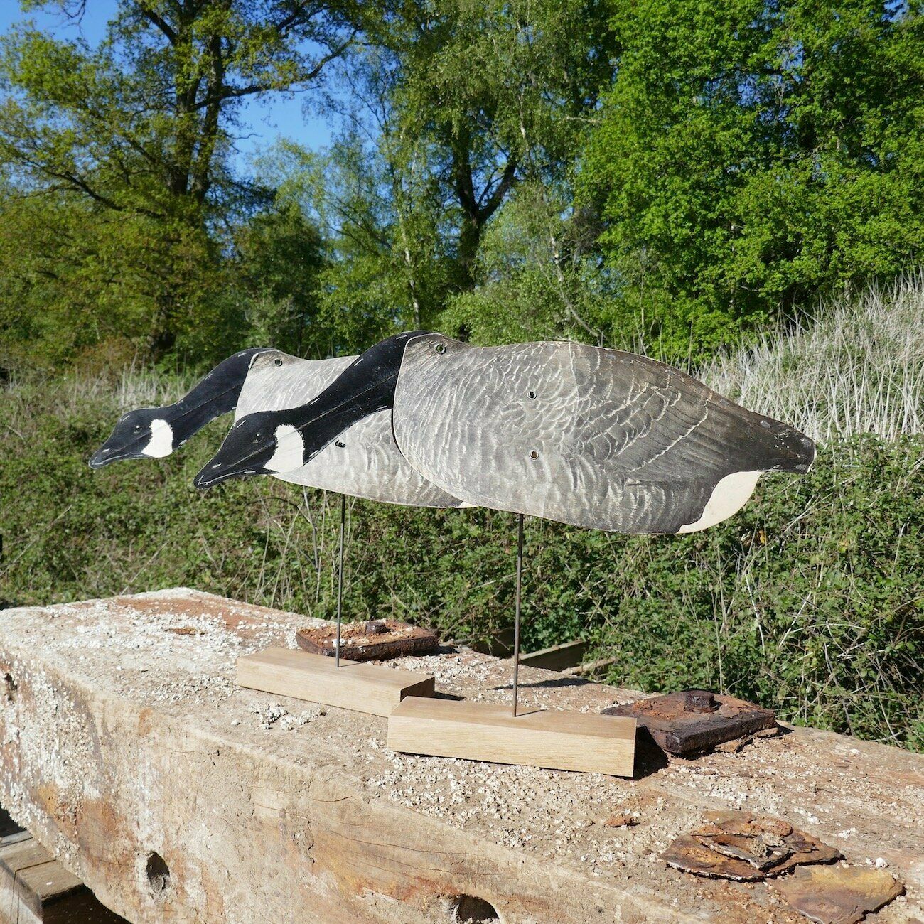 A Pair Of Feeding Folding Geese Decoys photo vinterior