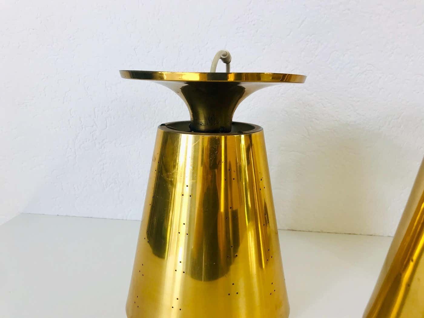 photo for sale Set Of 3 Polished Brass Pendant Lamps Attributed To Paavo Tynell, 1950s