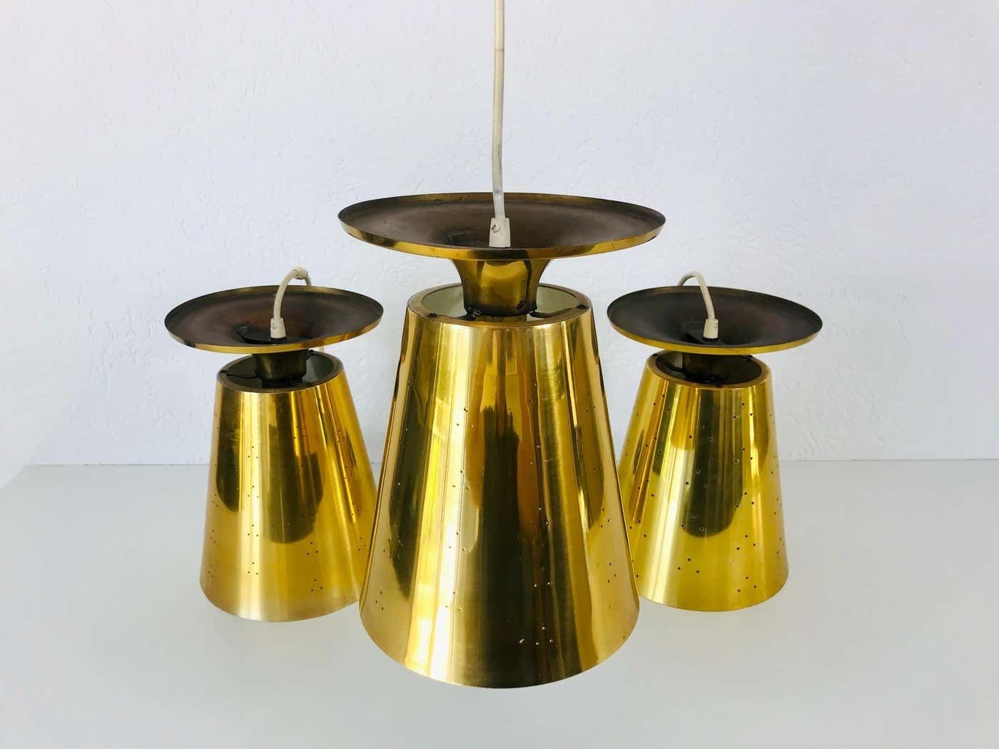 3160.0 Set Of 3 Polished Brass Pendant Lamps Attributed To Paavo Tynell, 1950s photo