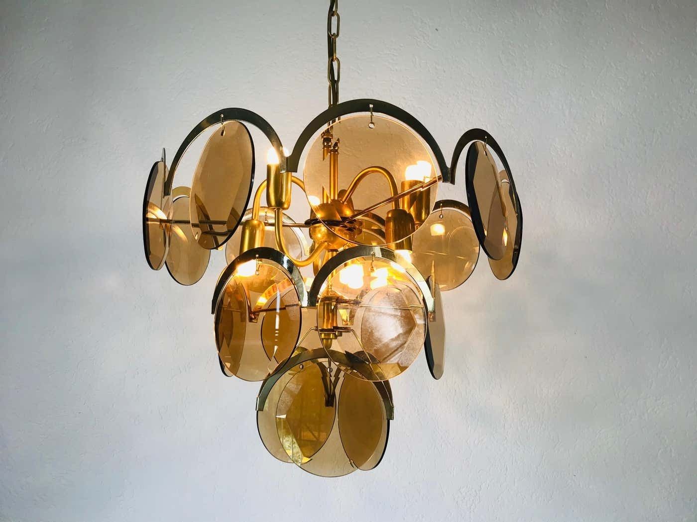 Midcentury Three Tier Brass And Glass Chandelier By Vistosi, 1960s photo for sale