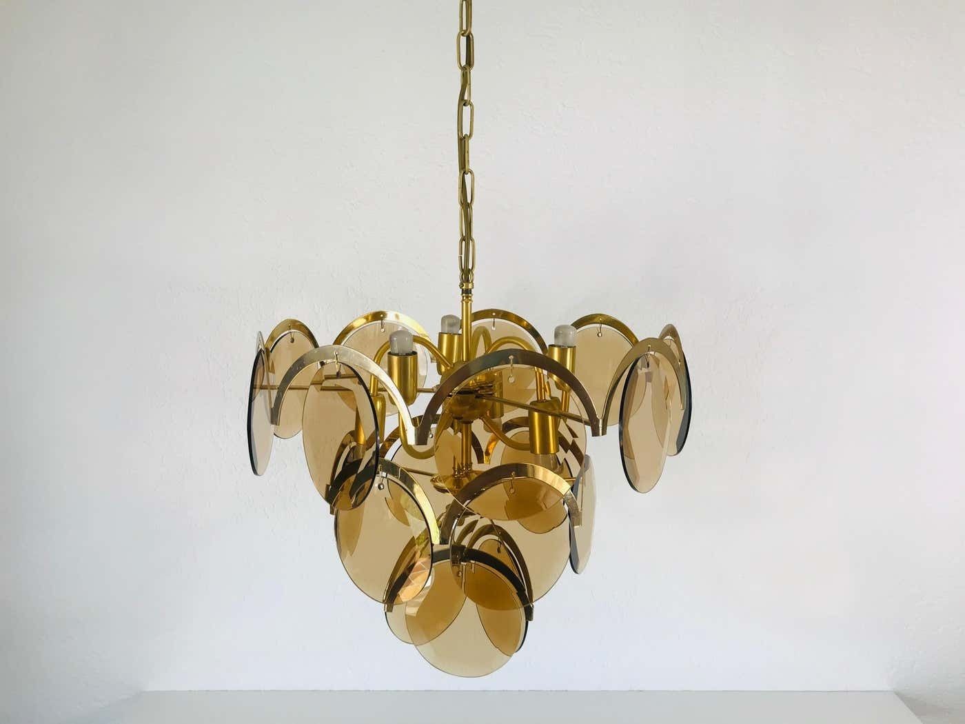 photo buy Midcentury Three Tier Brass And Glass Chandelier By Vistosi, 1960s