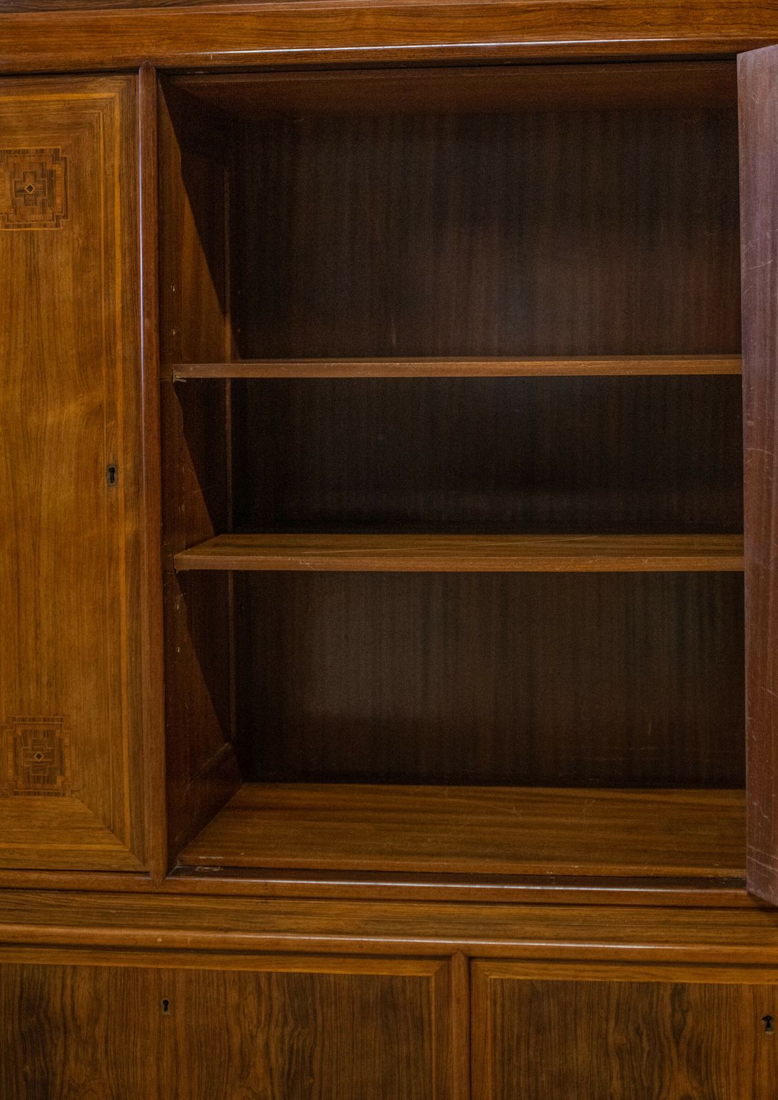 A Grand Rosewood Three Doored Fitted Salon Cabinet With Geometrically Veneered Fronts Raised On Turned Tapering Legs Ol photo buy