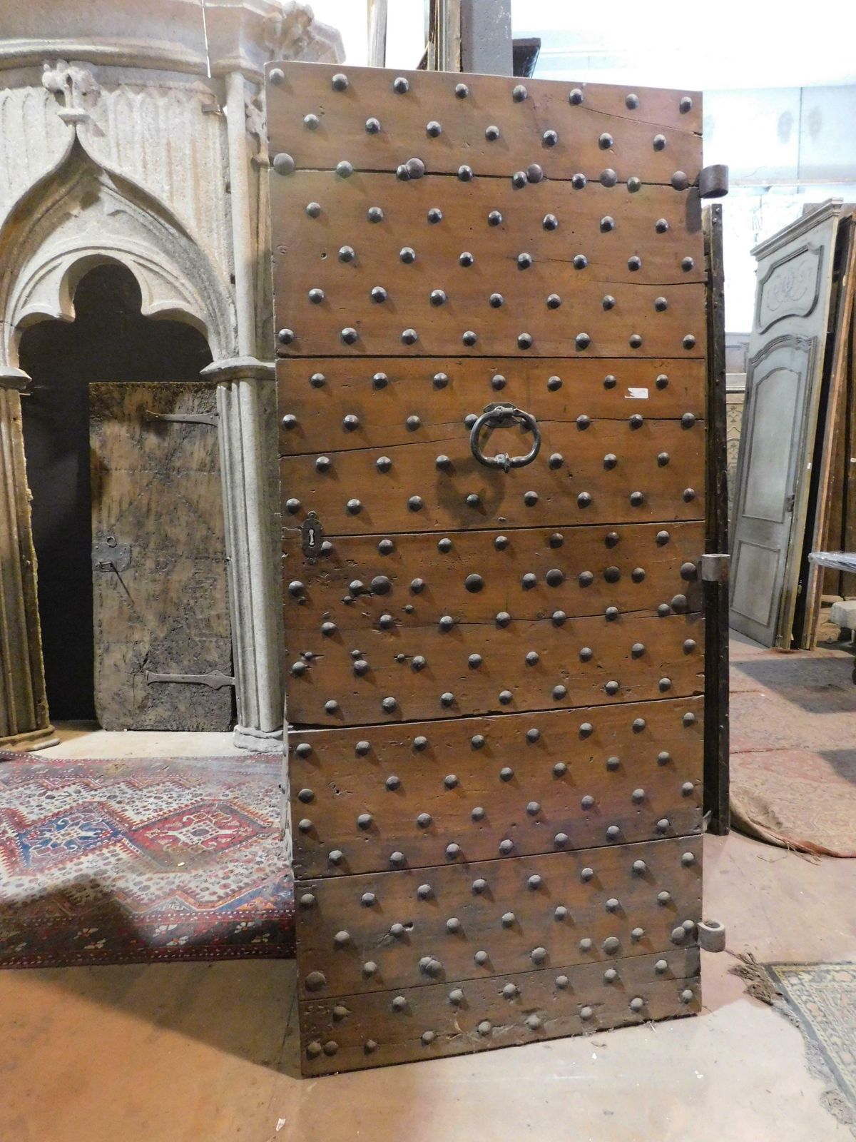 Old Rustic Entrance Door In Walnut With Nails, From Northern Italy photo for sale