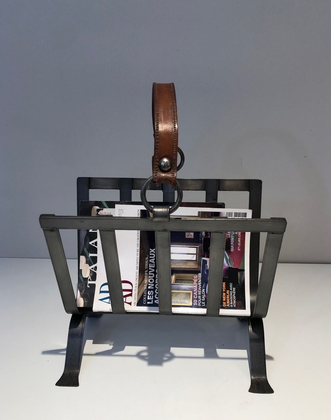 Steel And Leather Magazine Rack photo for sale
