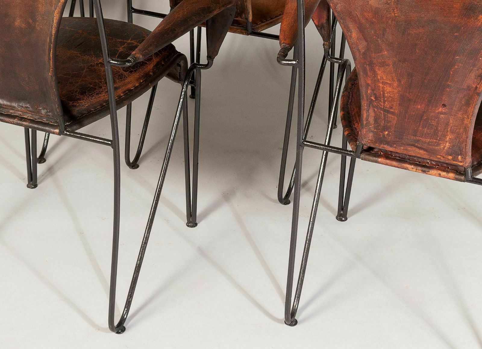 Set Of 4 1950s French Jacques Adnet Iron Frame With Stitched Leather Armchairs photo vintage