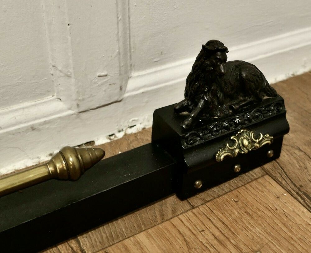 A Brass And Iron Country House Fender With Mountain Goats photo Home Fixtures