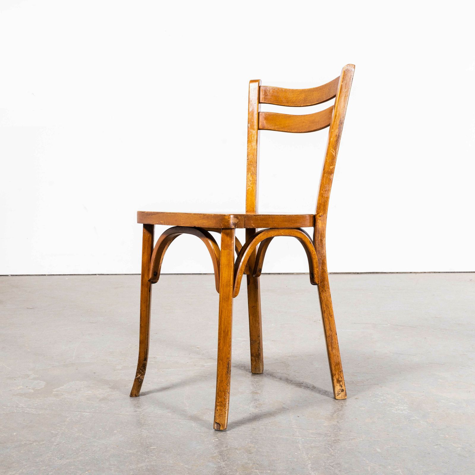 photo furniture 1950’s French Baumann Wavy Back Bentwood Dining Chairs – Set Of Four
