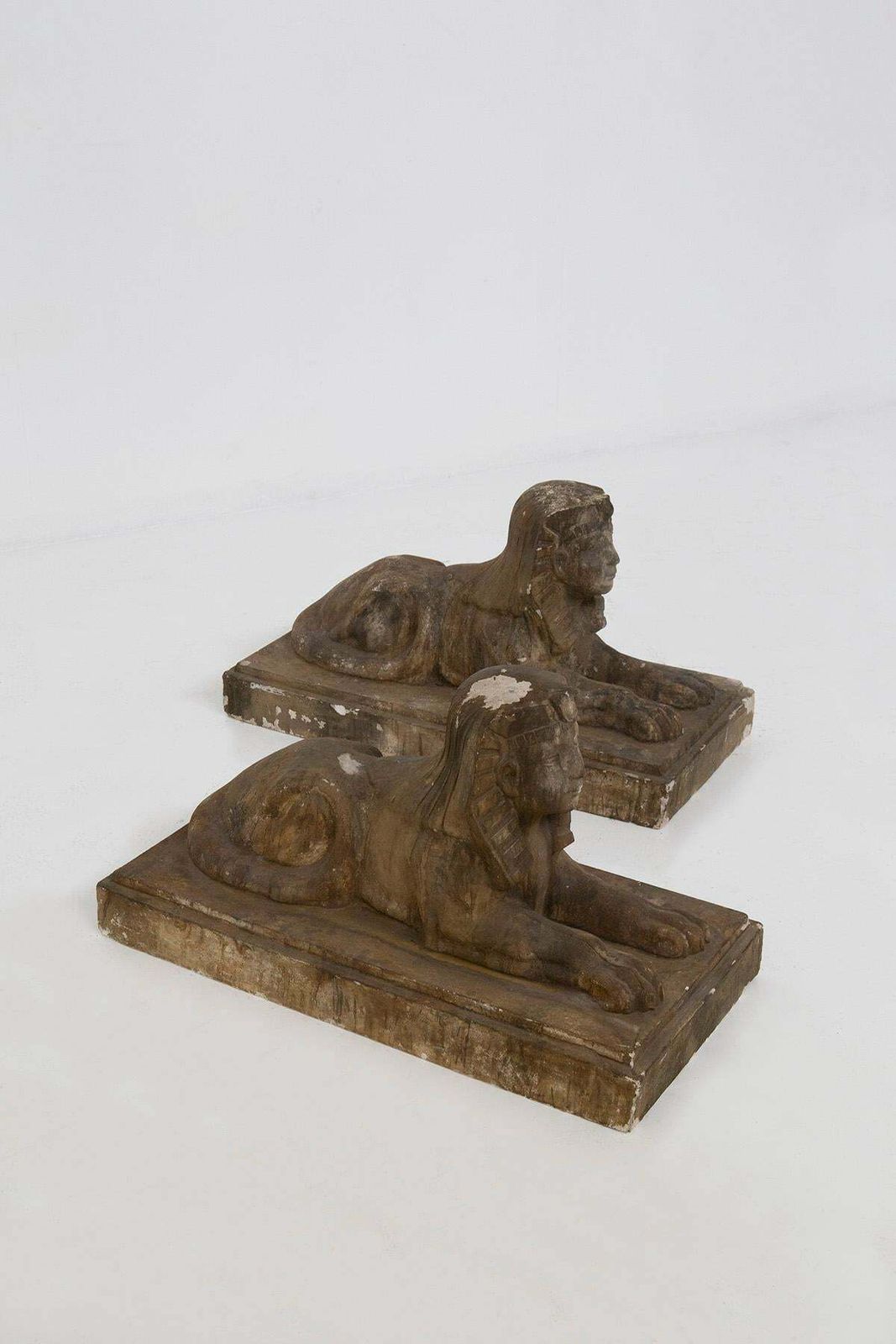 Pair Of Egyptian Sphinxes In Gold Coloured Scaiola Plaster photo vinterior