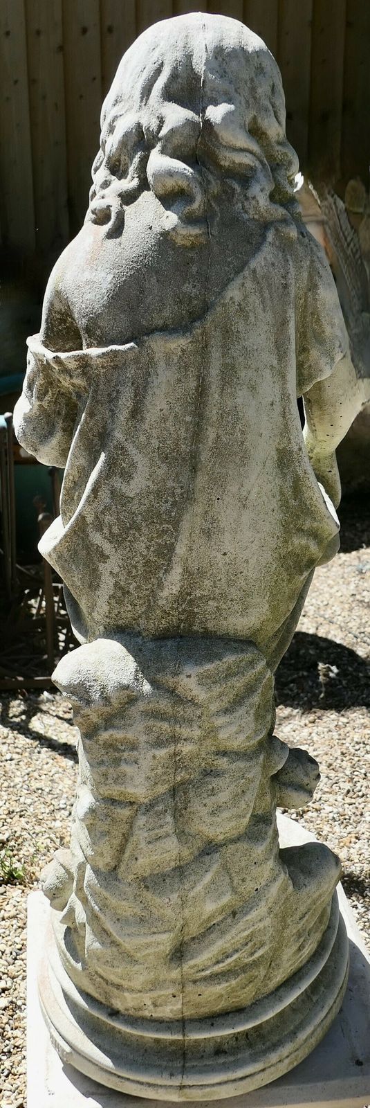 Statue Of A Girl Holding Out Her Apron photo 510.0