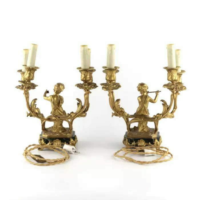 Paired Lamps Of Gilded Bronze With Cupids Playing Music photo for sale