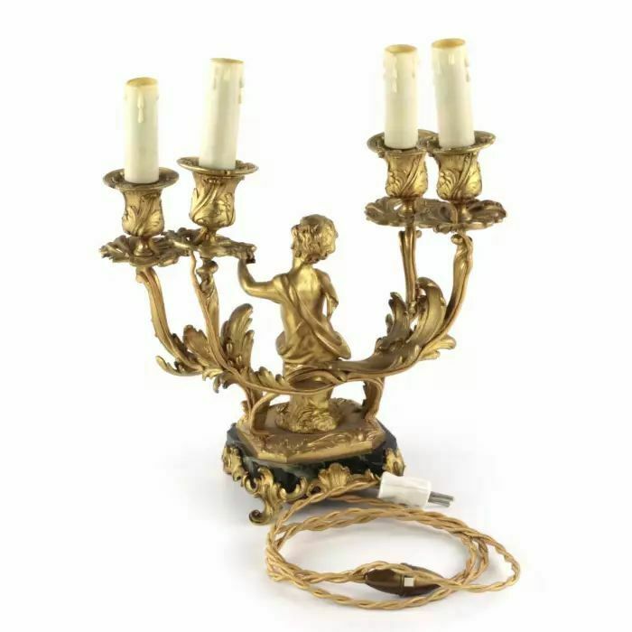 Paired Lamps Of Gilded Bronze With Cupids Playing Music photo vinterior
