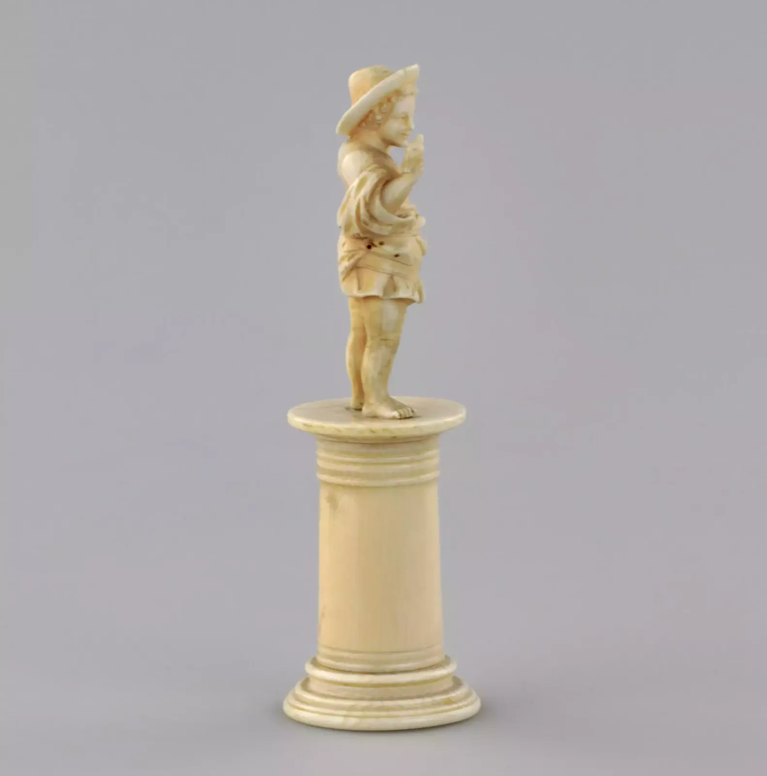 Carved Ivory Figurine Of A Boy With A Bird 1800s. photo 359.0