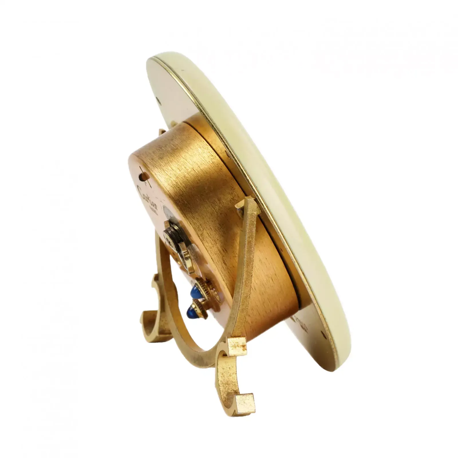 Cartier. Travel Alarm Clock Made Of Gilded Metal With Enamel. photo furniture