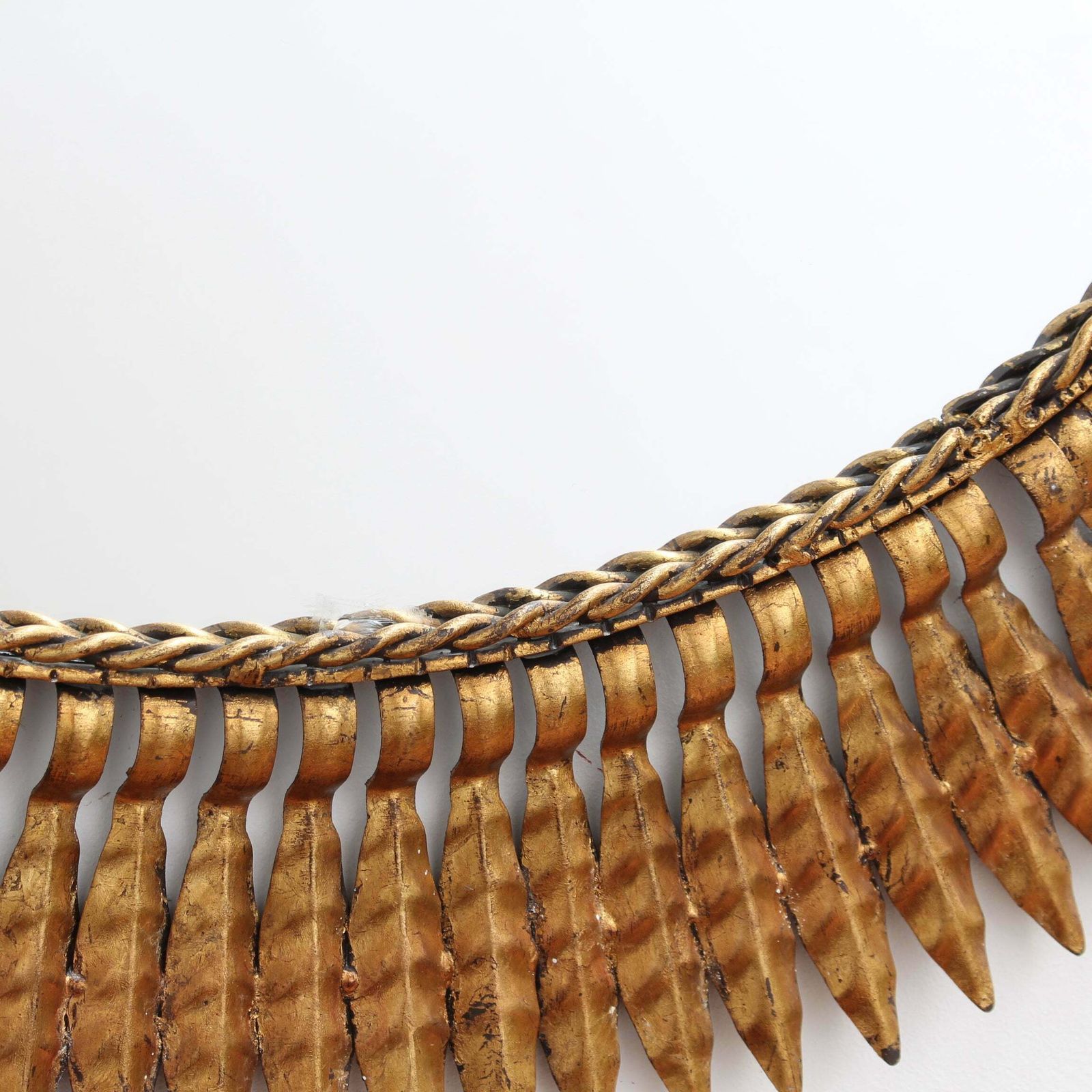 photo furniture Mid Century Spanish Gilt Metal Sunburst Mirror With Leaf Motif, Circa 1960s.