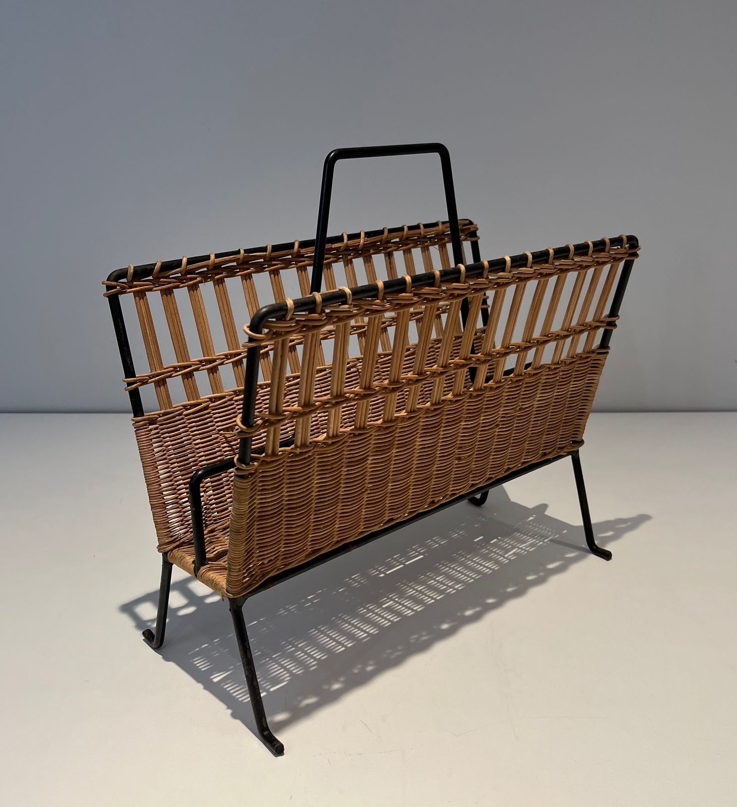photo for sale Pair Of Magazine Racks In Black Lacquered Metal And Rattan