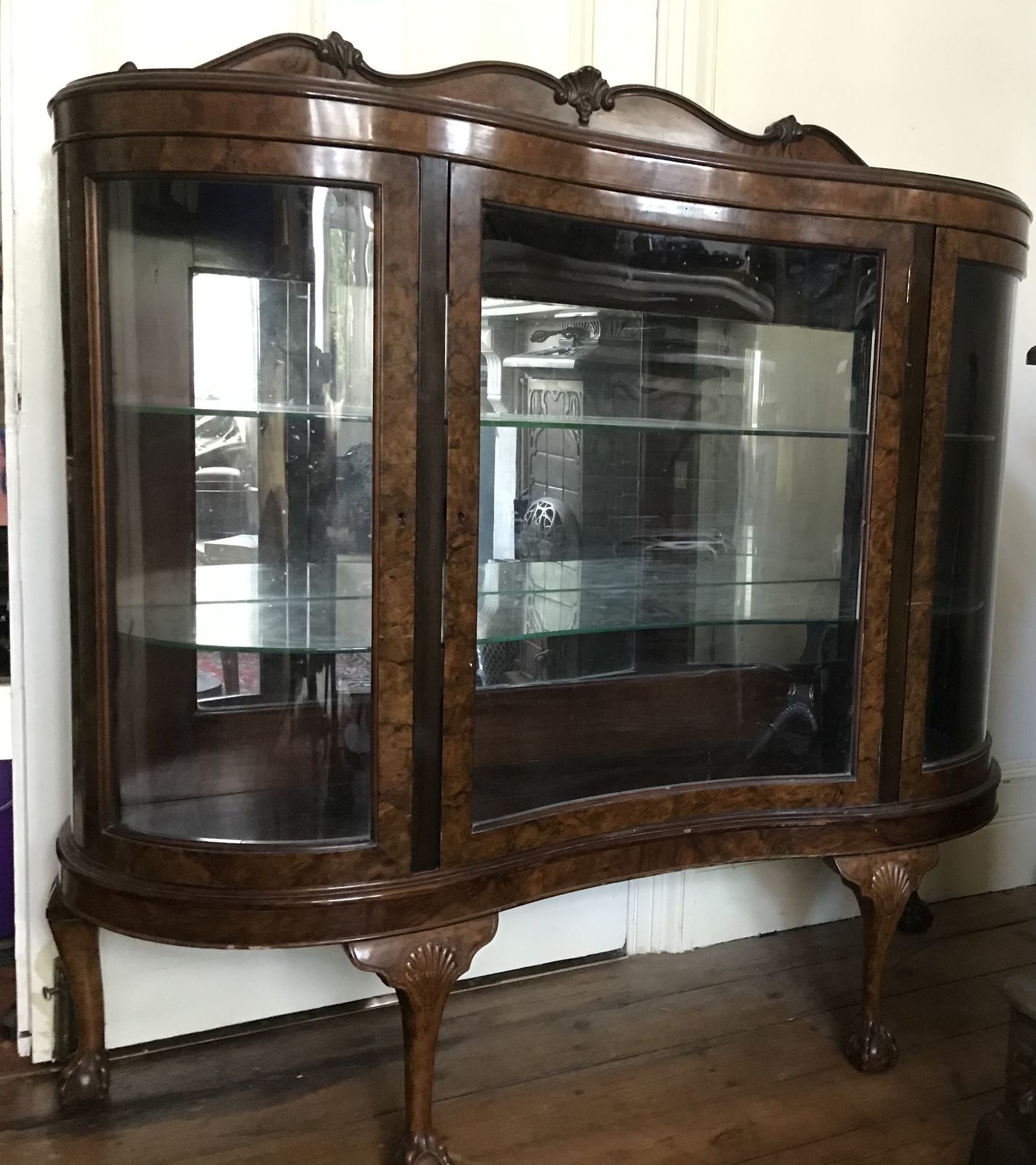 Glass Fronted Display Cabinet With Two Glass Shelves And Mirrored Interior. The Wood Is Walnut. photo furniture