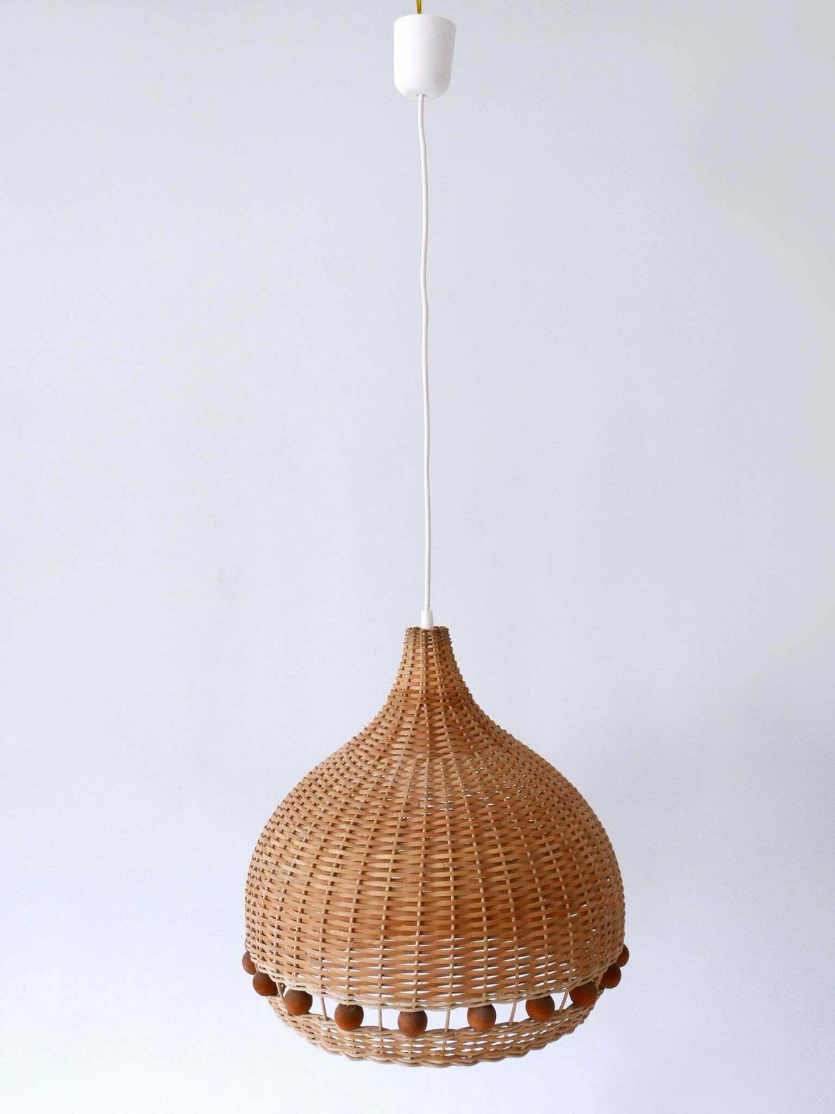 1777.0 Mid Century Modern Rattan Tulip Pendant Lamps Or Hanging Lights Germany 1960s photo