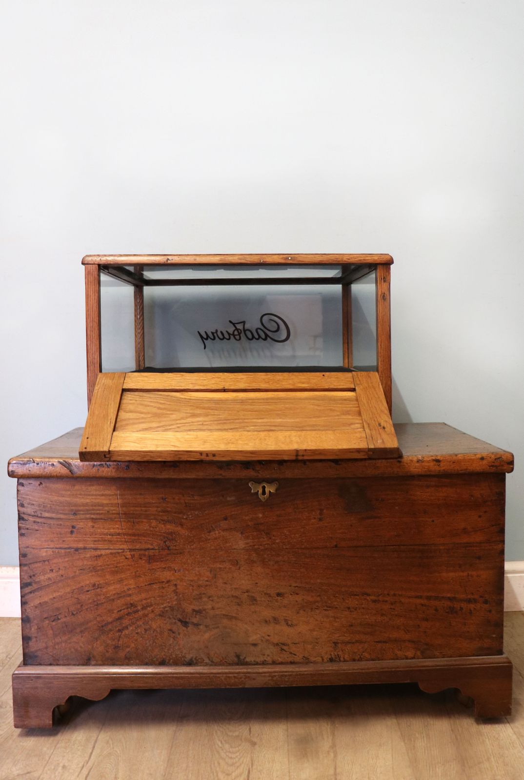 photo buy A Lovely Early 20th Century Oak Countertop Display Cabinet, Later Sign Written For Cadburys Chocolate.