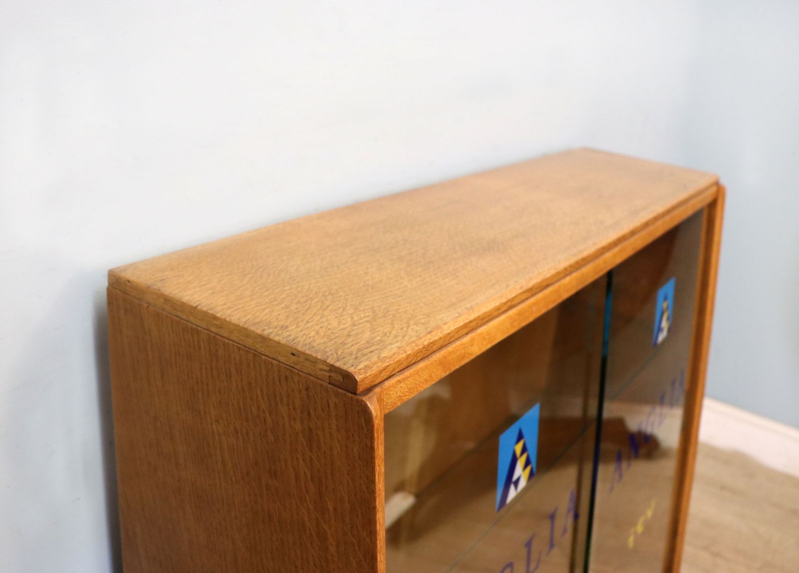 This Lovely Quality Mid Century Retro Display Cabinet Later Sign Written For Anglia Television. photo vintage