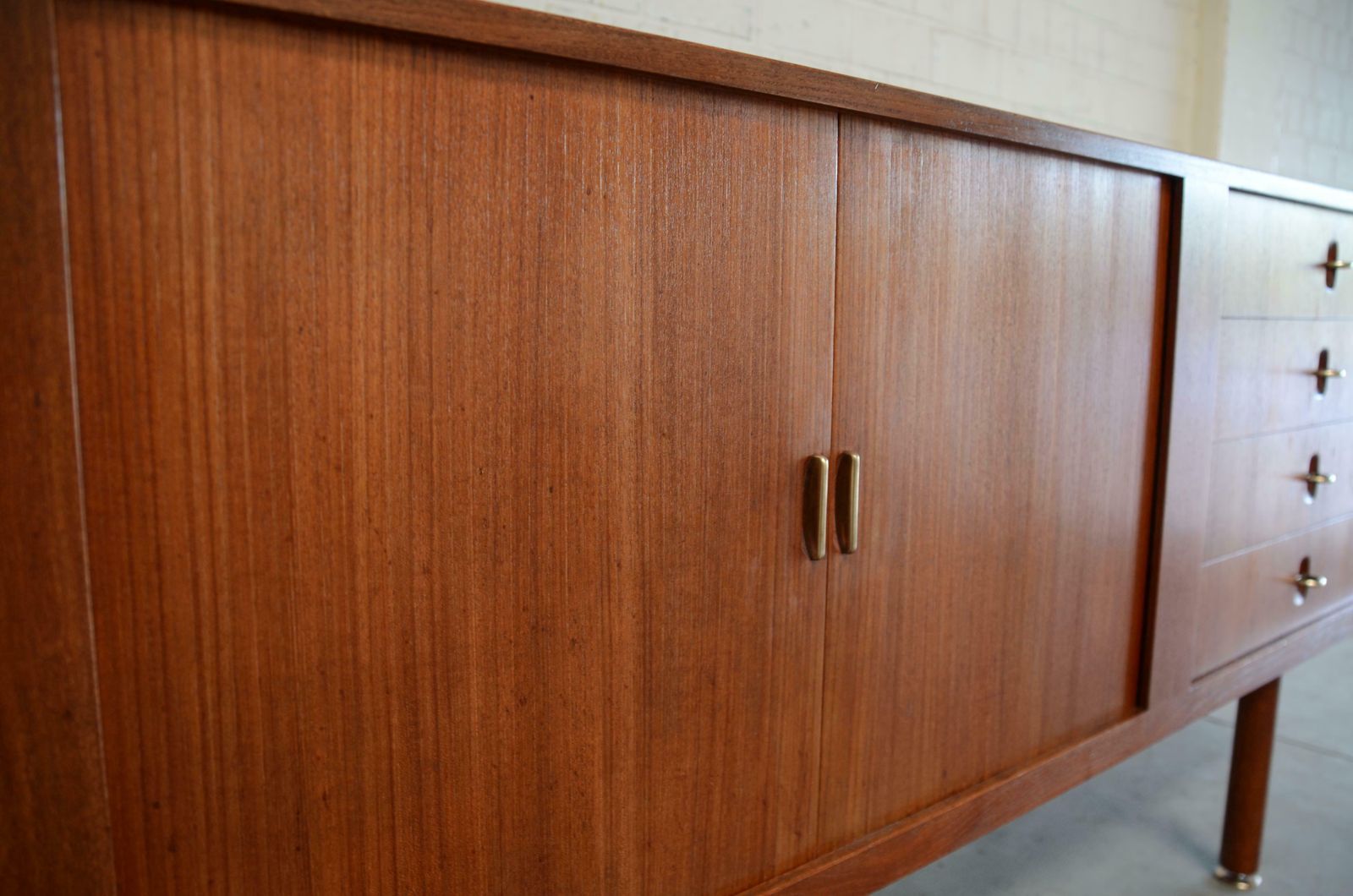 photo furniture Aksel Bender Madsen & Ejner Larsen Sideboard In Teak & Brass With Tambour Doors