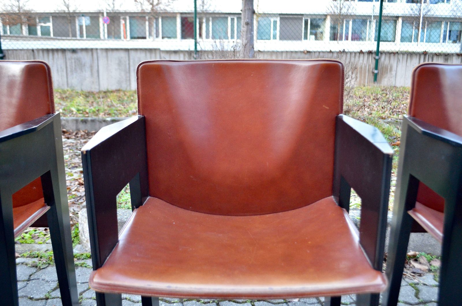 photo buy Arnold Merckx For Arco Cognac Saddle Leather Dining Chair Set Of 4