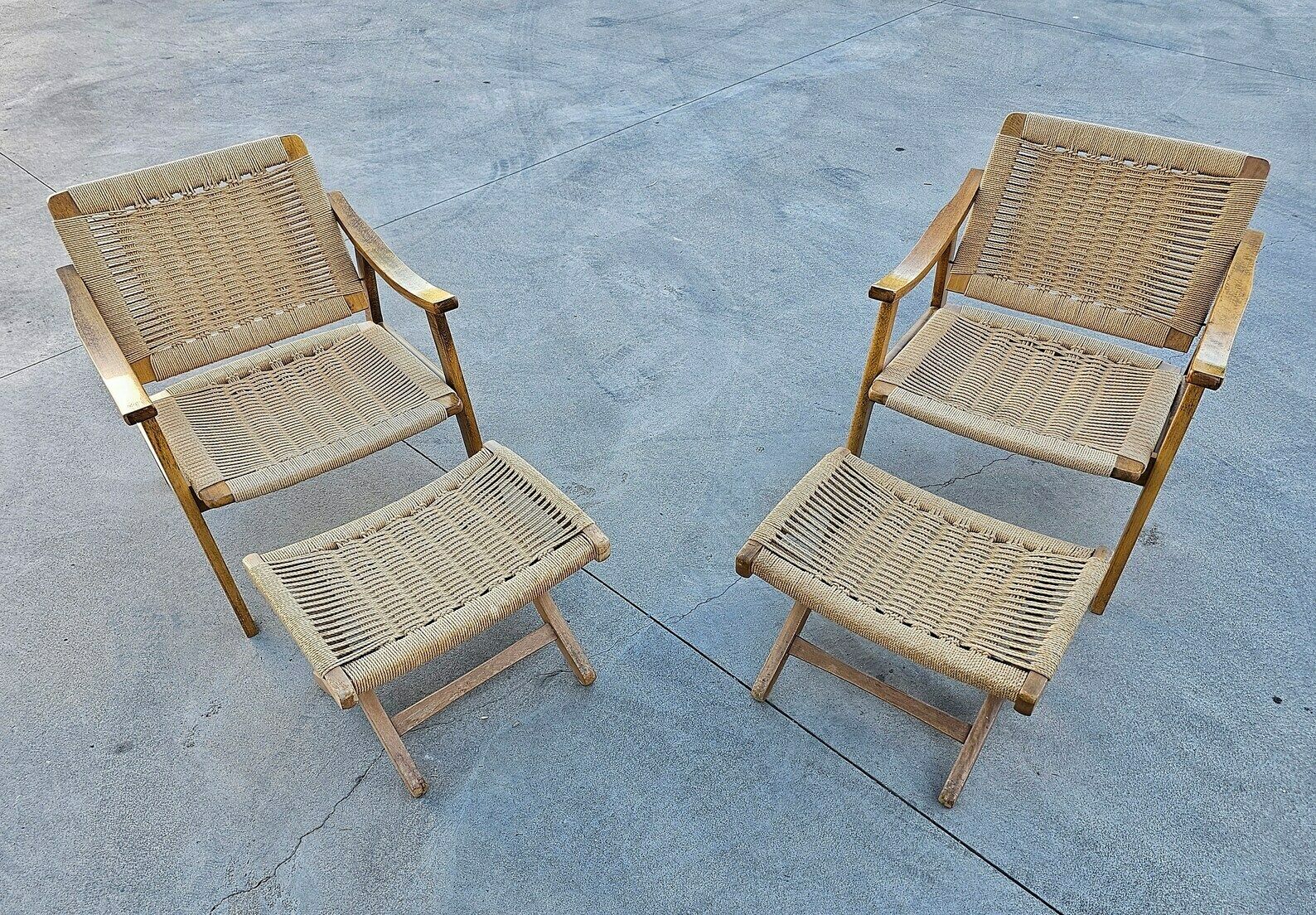 Pair Of Mid Century Modern Armchairs With Ottomans Done In Oak And Danish Paper Cord Done In Hans J. Wegner Style / Made In Yugoslavia In 1960s photo for sale