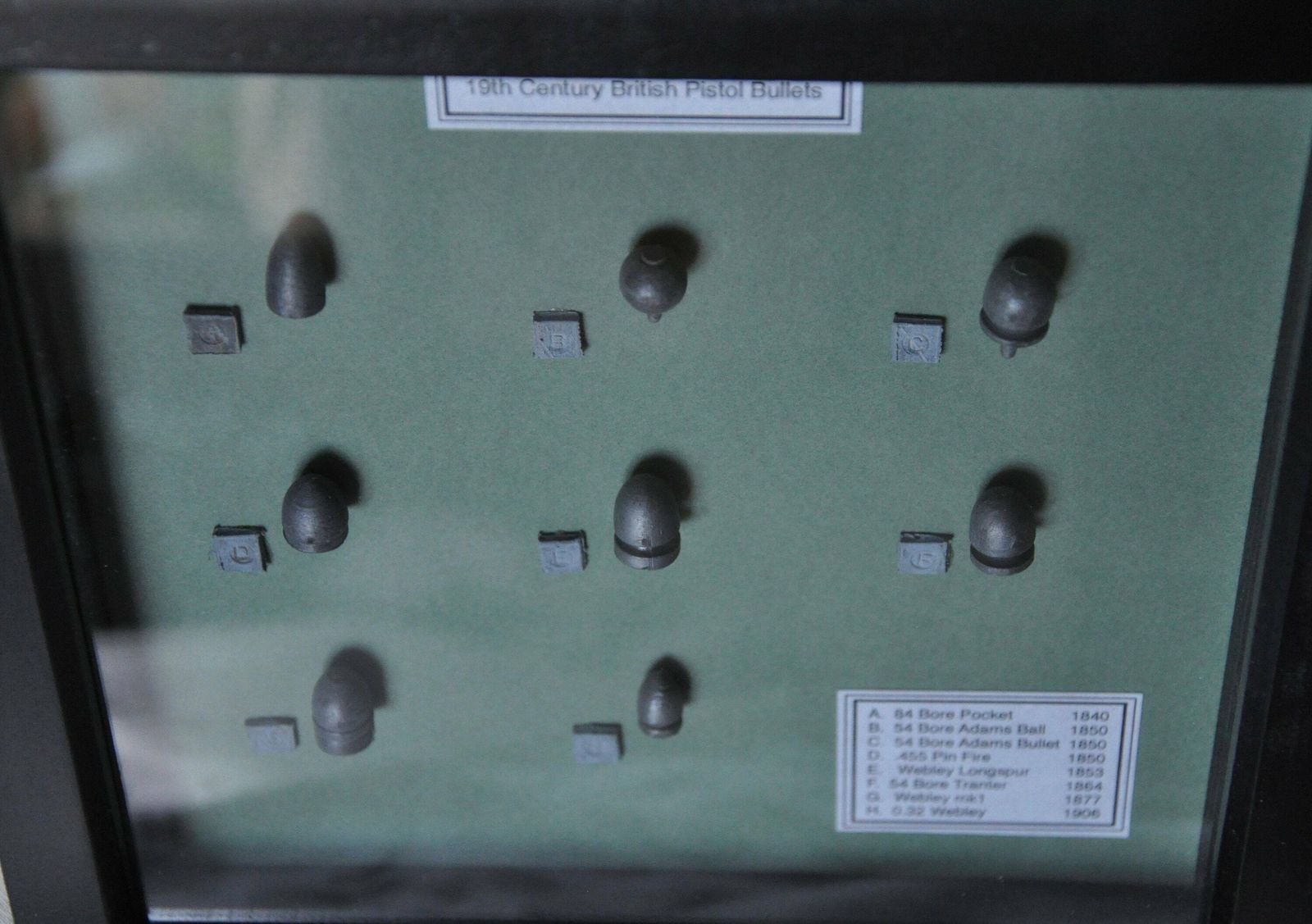 19th Century British Pistol Cast Lead Bullets In Display Frame photo 100.0