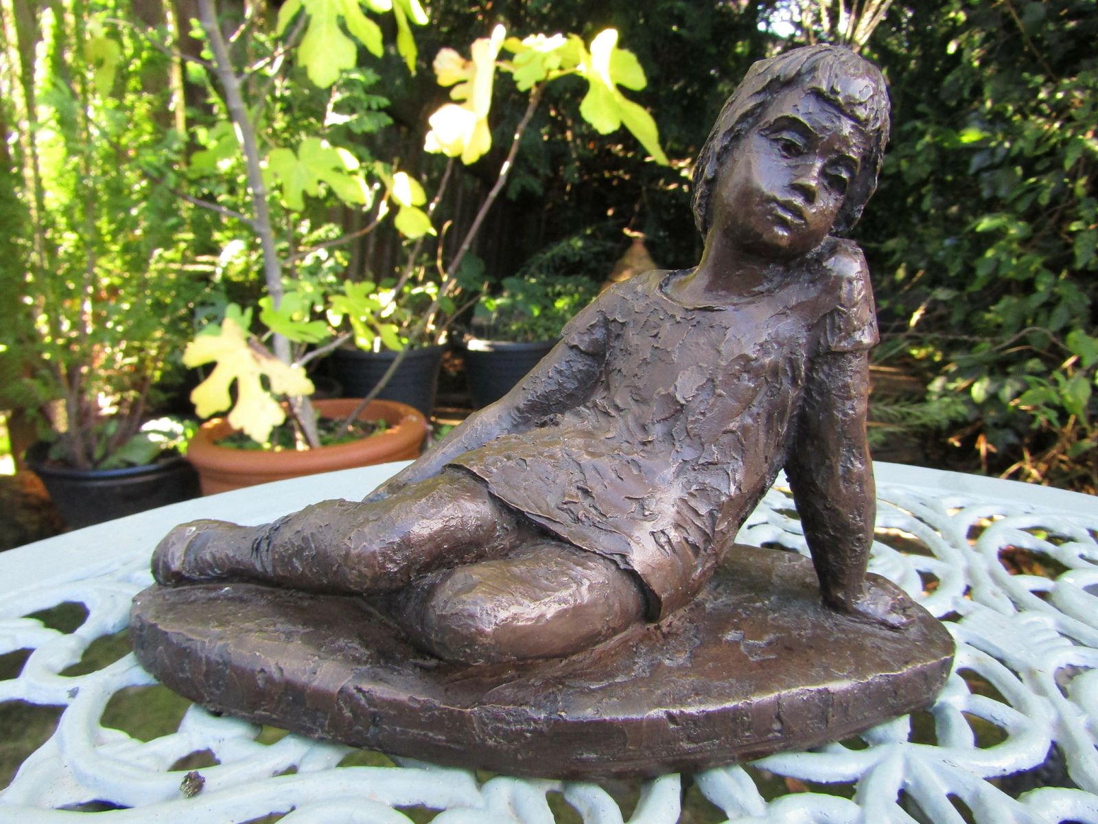 Bronzed Figure Of Girl Seated, Signed Kj For Kari Juva