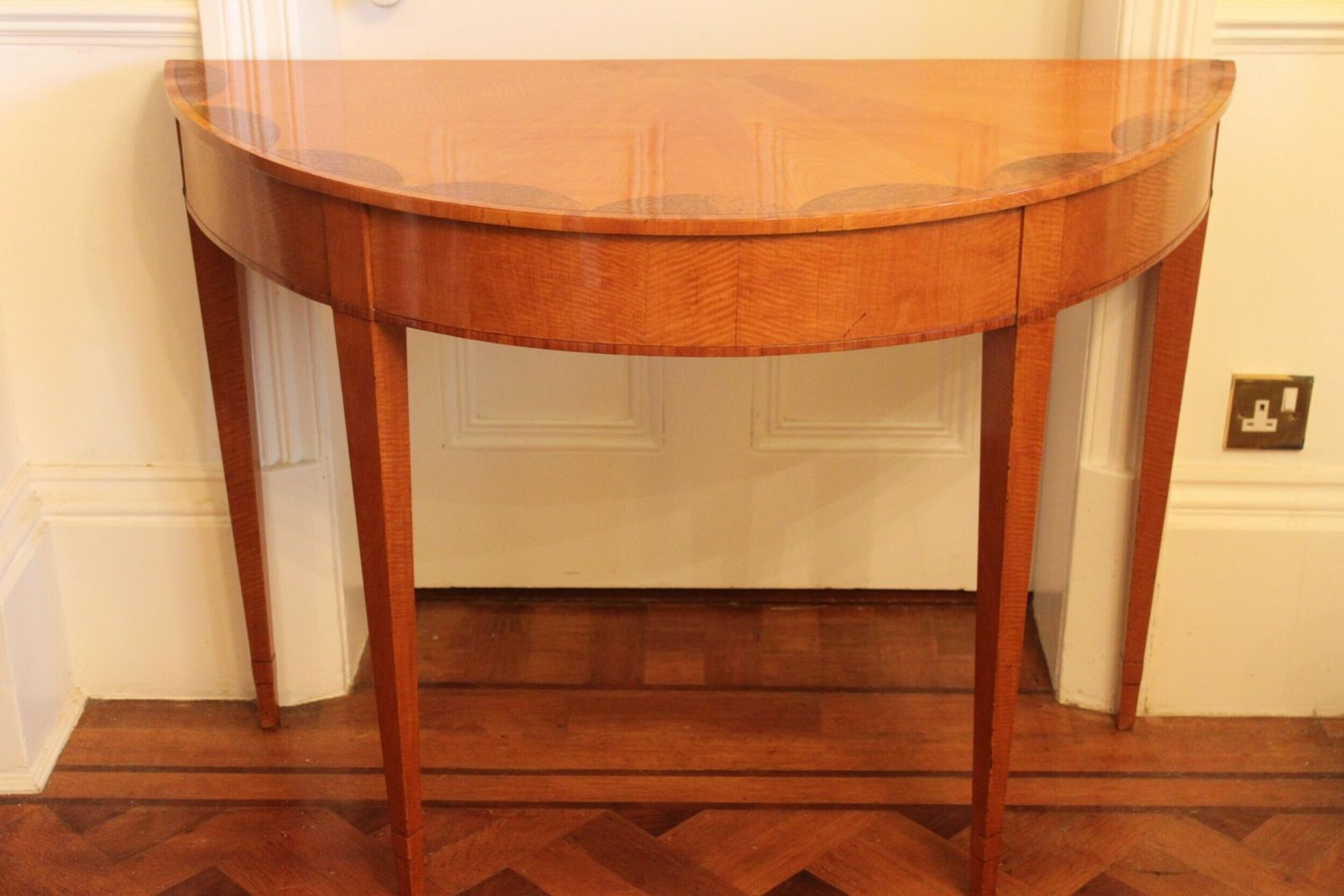 An Early 19th Century Satinwood Demi Lune Console Table