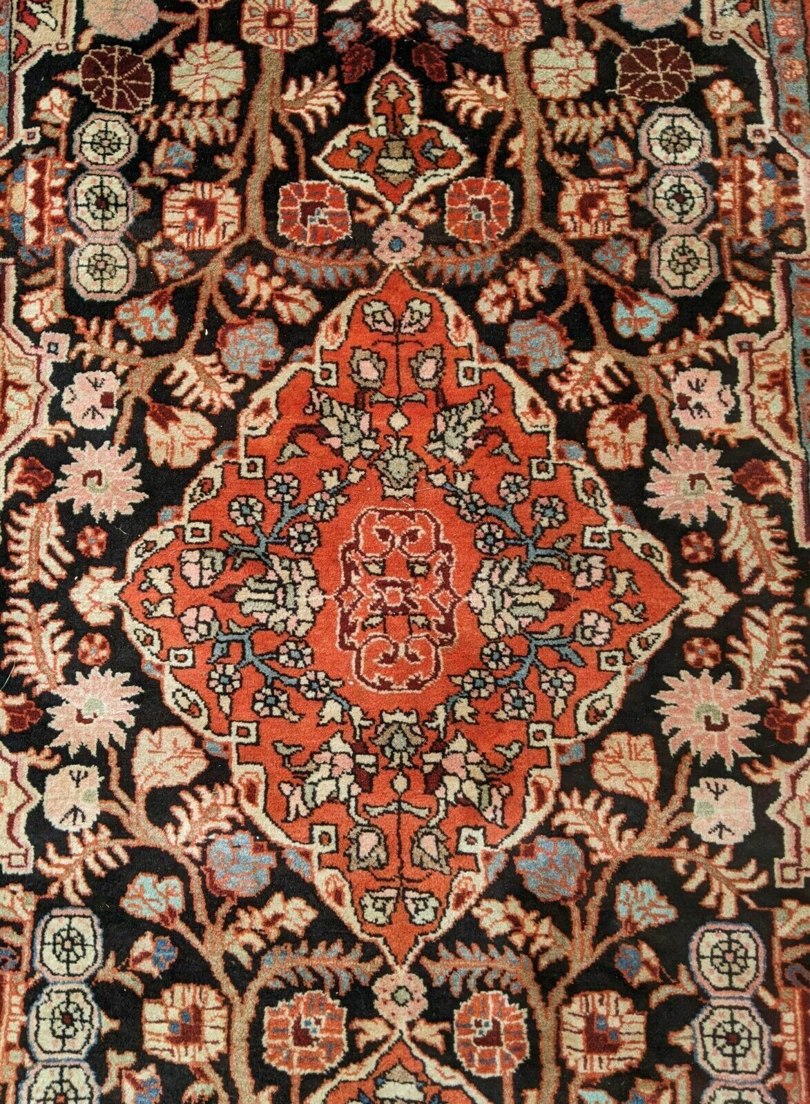 Handwoven Woollen Hamadan Carpet photo Textiles