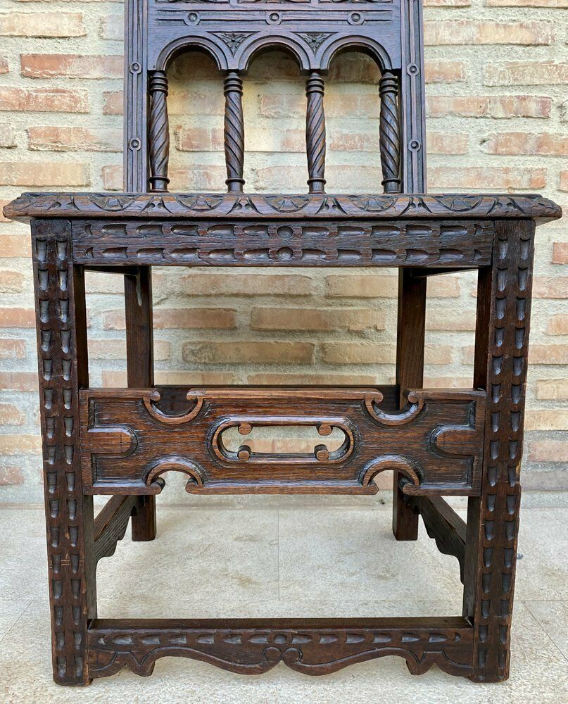 photo for sale Early 20th Century Spanish Carved Chairs With Wood Seat, 1890s, Set Of 2