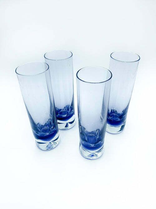 photo vintage Set Of Four Drinking Glasses In Sculpted Purple Glass From The 1960s