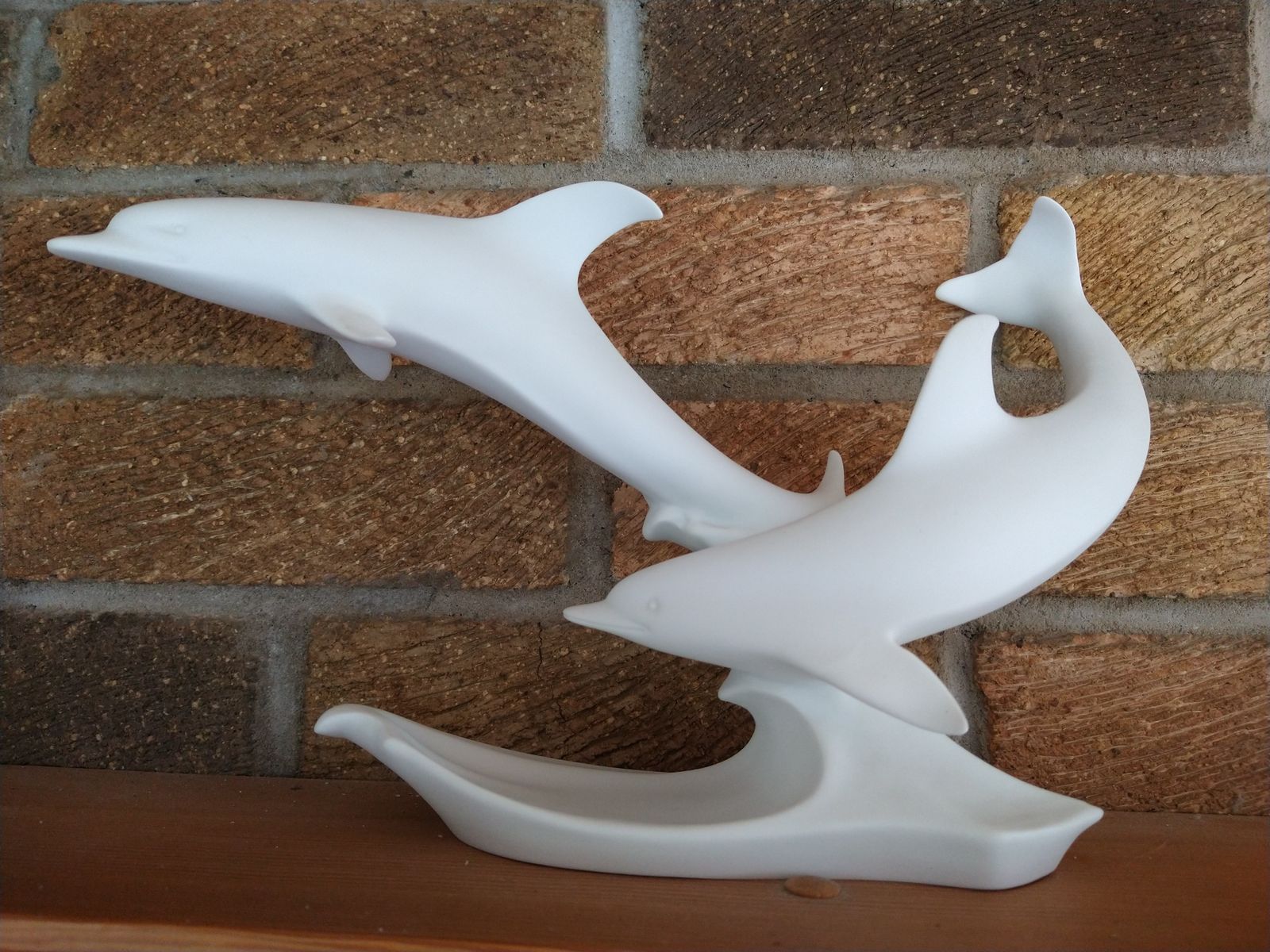 Bisque Porcelain Swimming Dolphins Sculpture By Kaiser